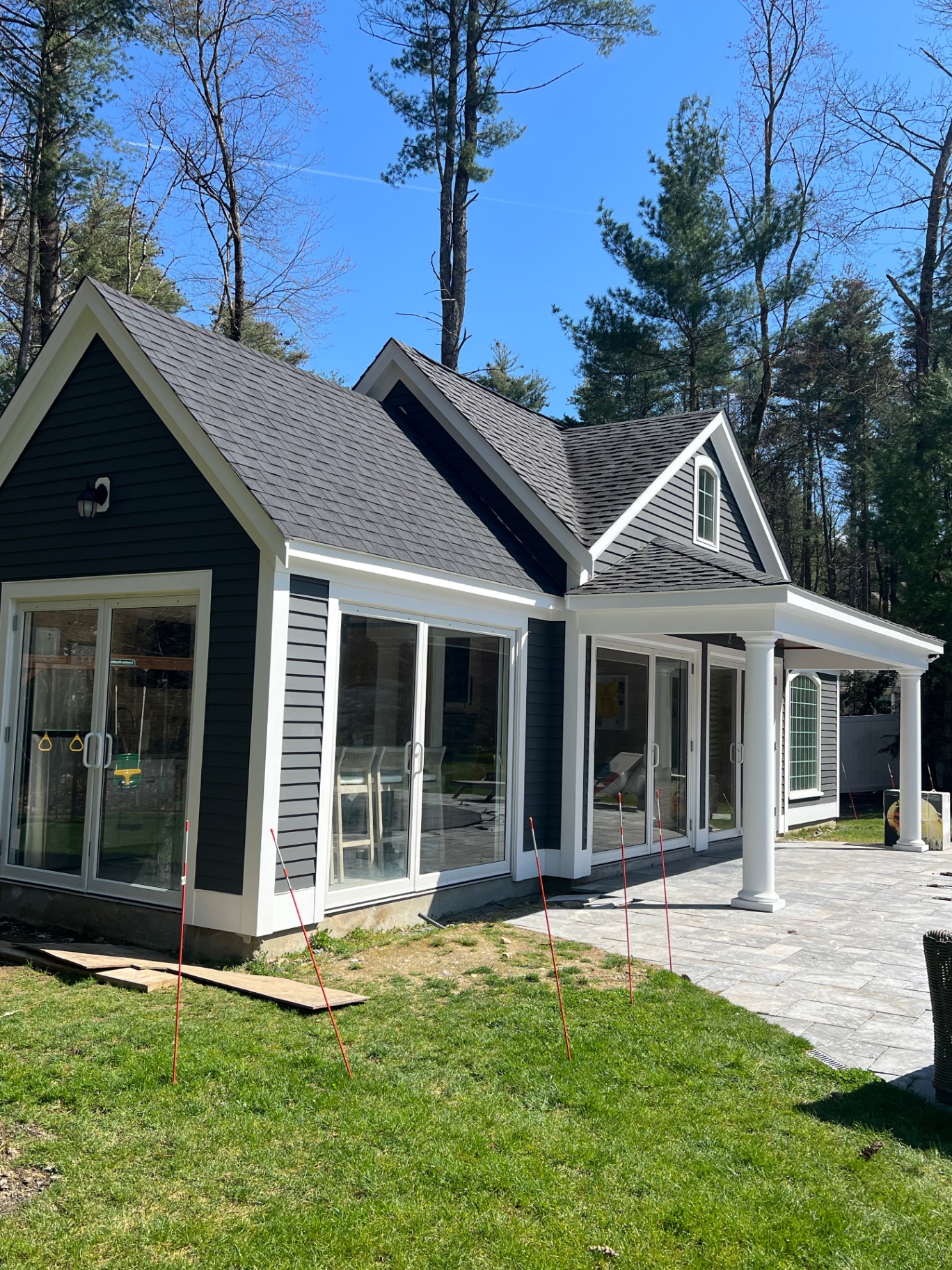 Custom pool house by Cane Hill Wood Works near Weston MA.