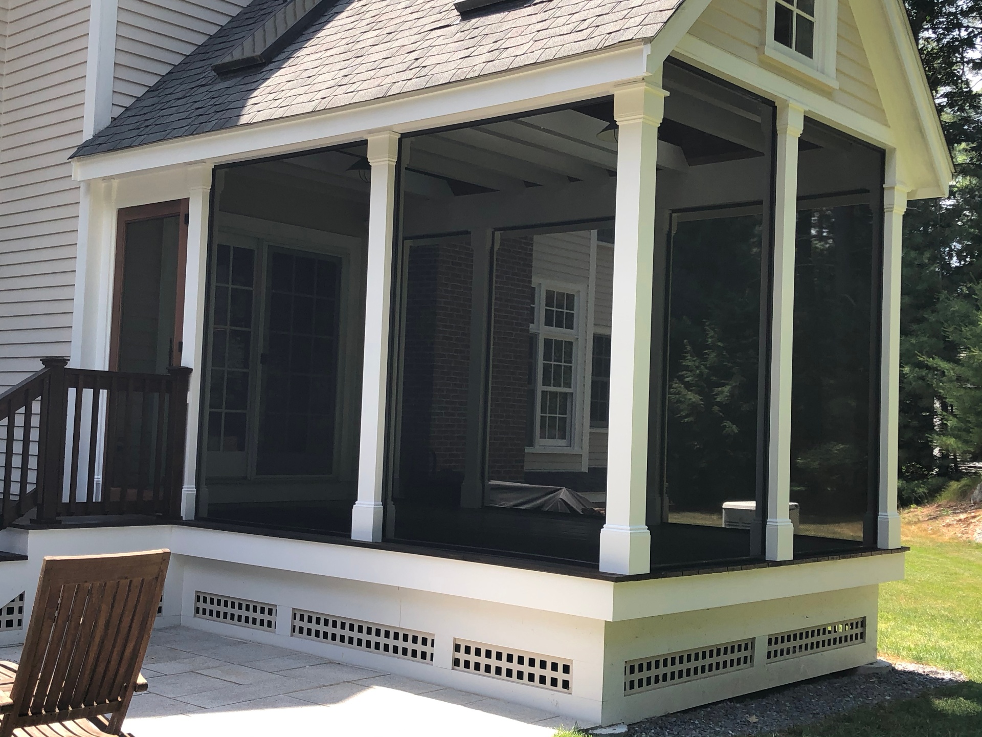 Screened room home addition by Cane Hill Wood Works near Weston MA.